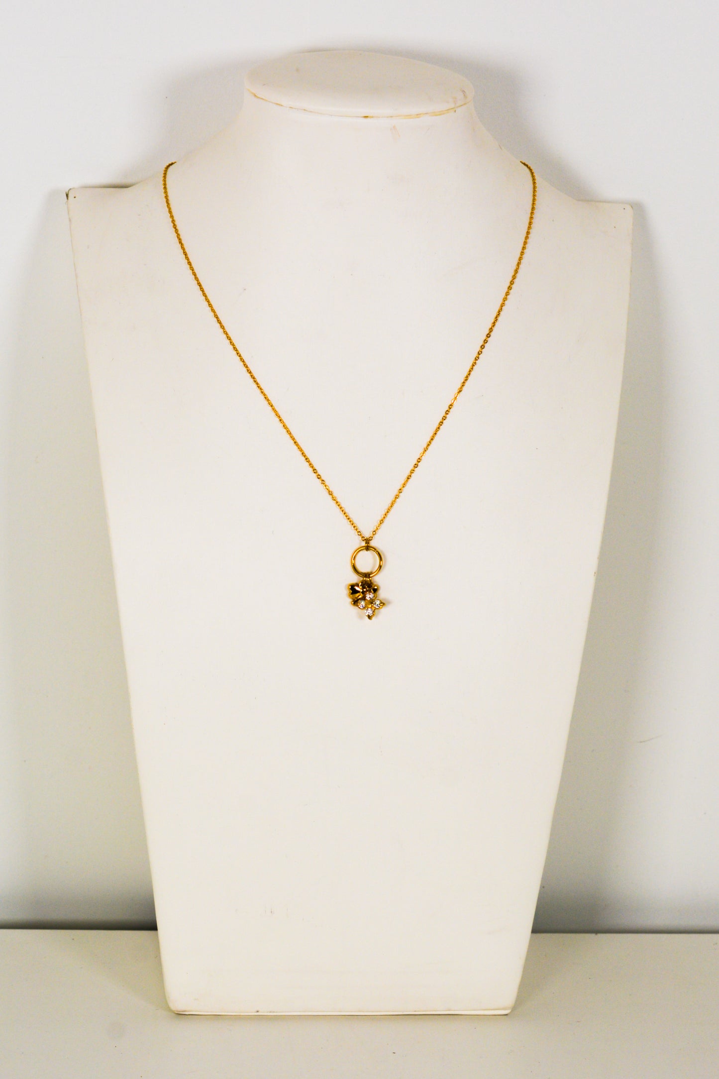 collana fiocco e quadrifoglio