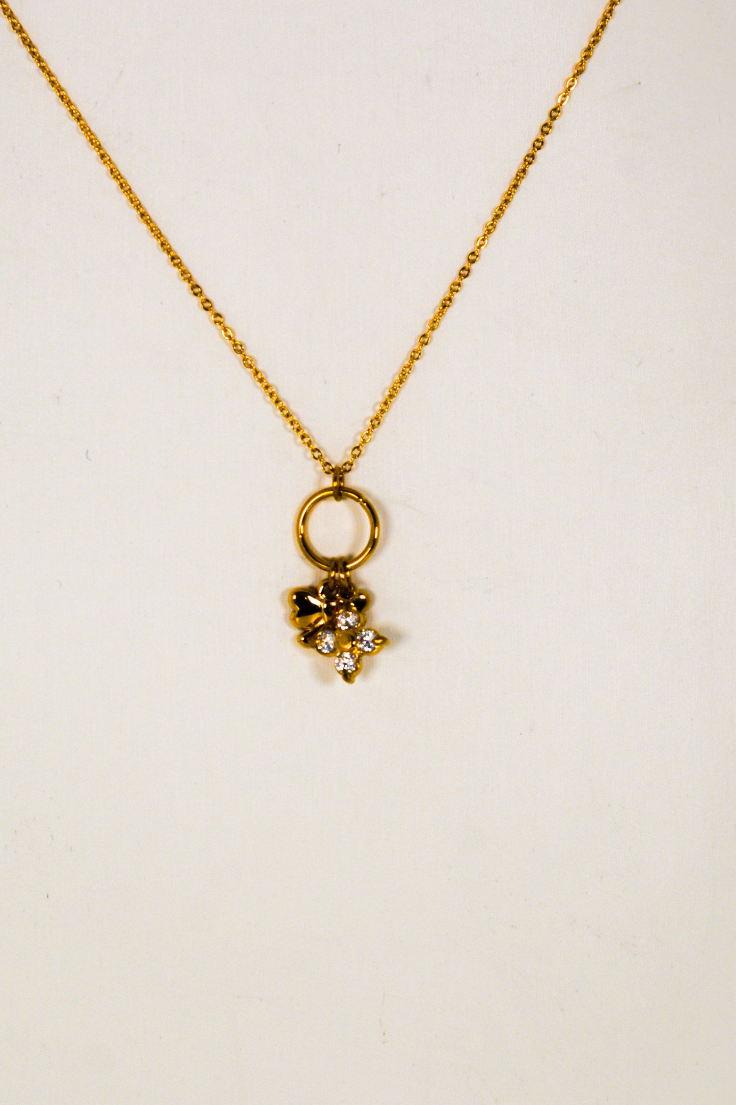 collana fiocco e quadrifoglio